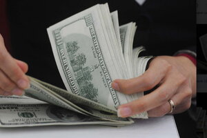 Ngân hàng Nhà nước giảm giá bán USD lần thứ 4 liên tiếp
